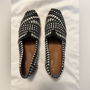 Tom’s slip on shoes.